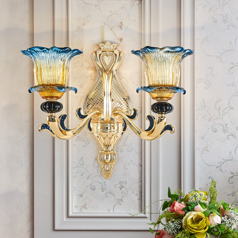 Antiqued Gold Flower Wall Sconce With Clear Ruffle Glass Bulbs - Curved Arm Mounted Lamp