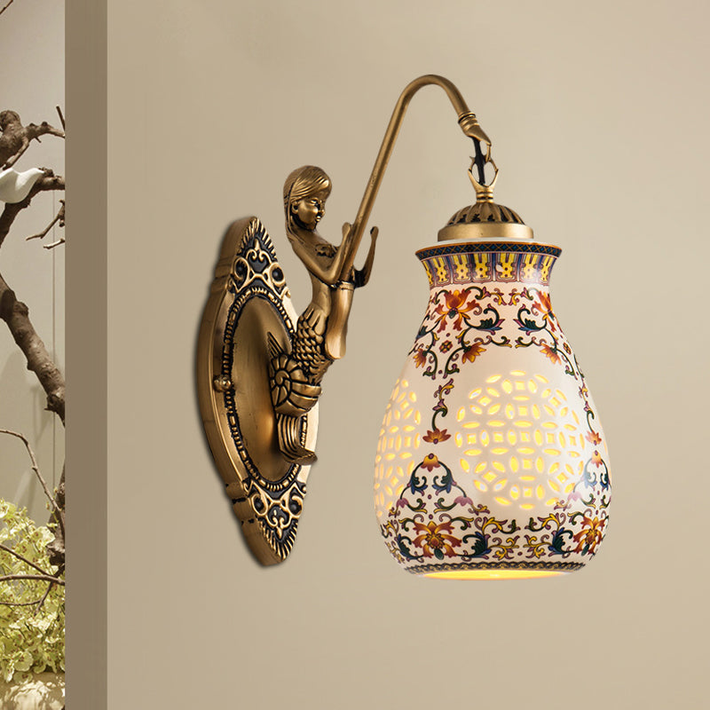 Antique Brass Ceramic Wall Sconce With Pierced Jar Traditional Patterned Design And Small Mermaid