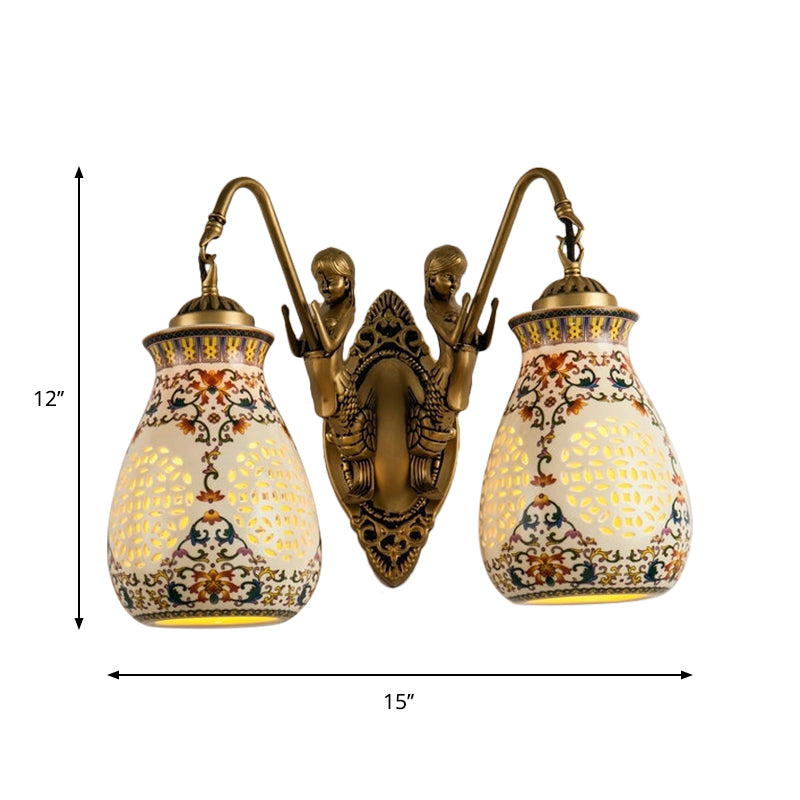 Antique Brass Ceramic Wall Sconce With Pierced Jar Traditional Patterned Design And Small Mermaid