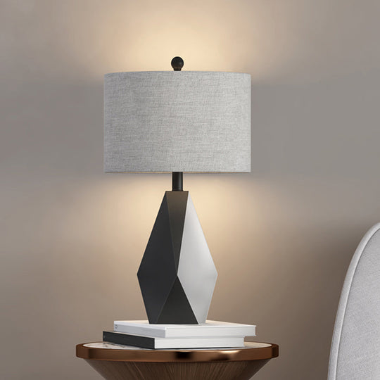 Minimal Grey Fabric Cylinder Table Lamp With Metal Geometric Base And Night Lighting