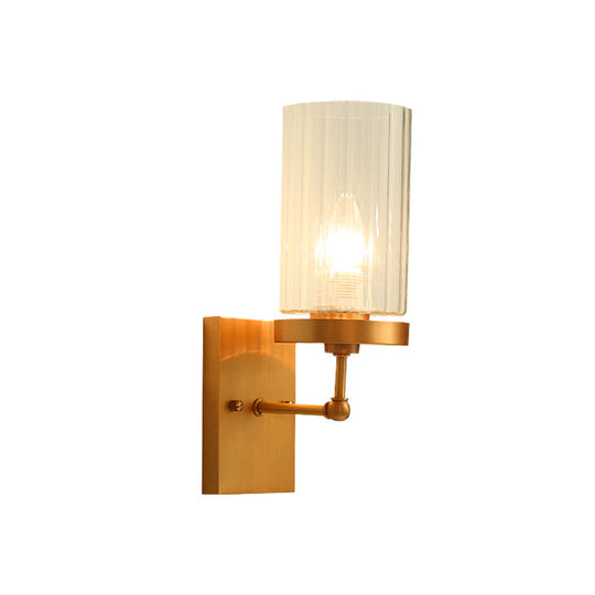 Clear Ribbed Glass Cylinder Wall Sconce In Gold - Bedroom Lighting Fixture