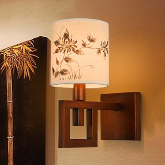 Rustic White Fabric Wall Sconce Light For Study Room - 1-Light Cylinder Fixture With Floral Pattern