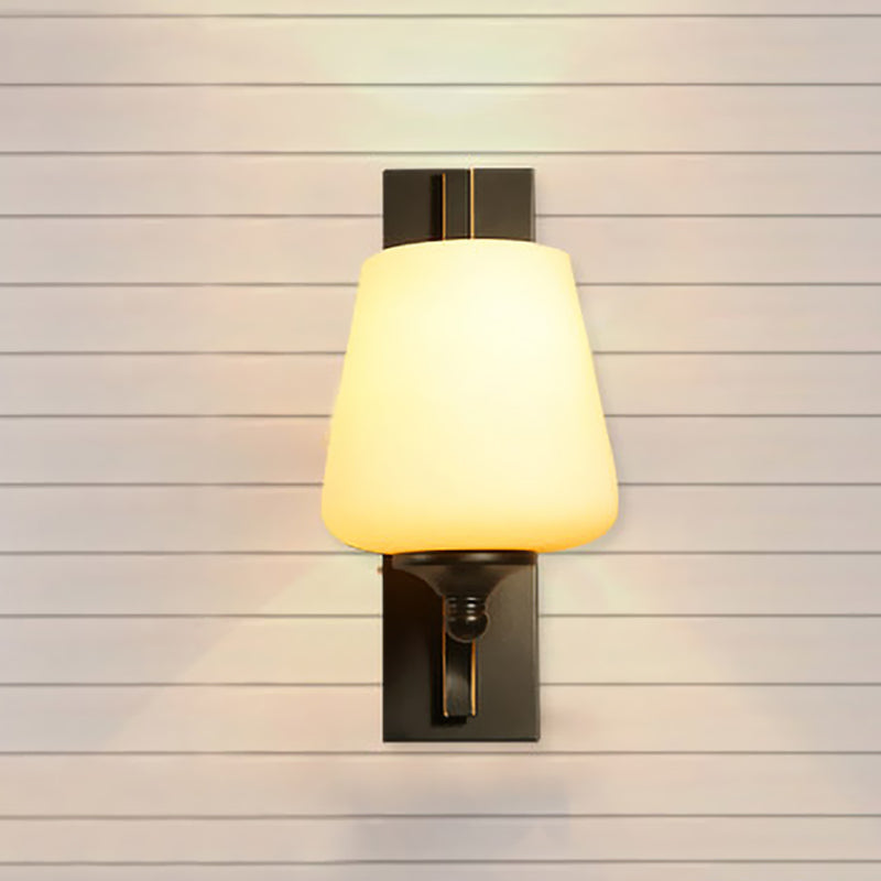 Black Tapered Wall Sconce With Frosted White Glass For Bedroom Lighting