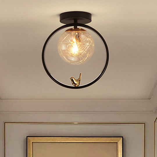 Contemporary Clear Glass Ceiling Light: Spherical Semi Flush Fixture with Single Bulb, Black Mount and Globe/Bird Decor