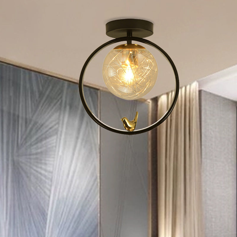 Contemporary Clear Glass Ceiling Light: Spherical Semi Flush Fixture with Single Bulb, Black Mount and Globe/Bird Decor