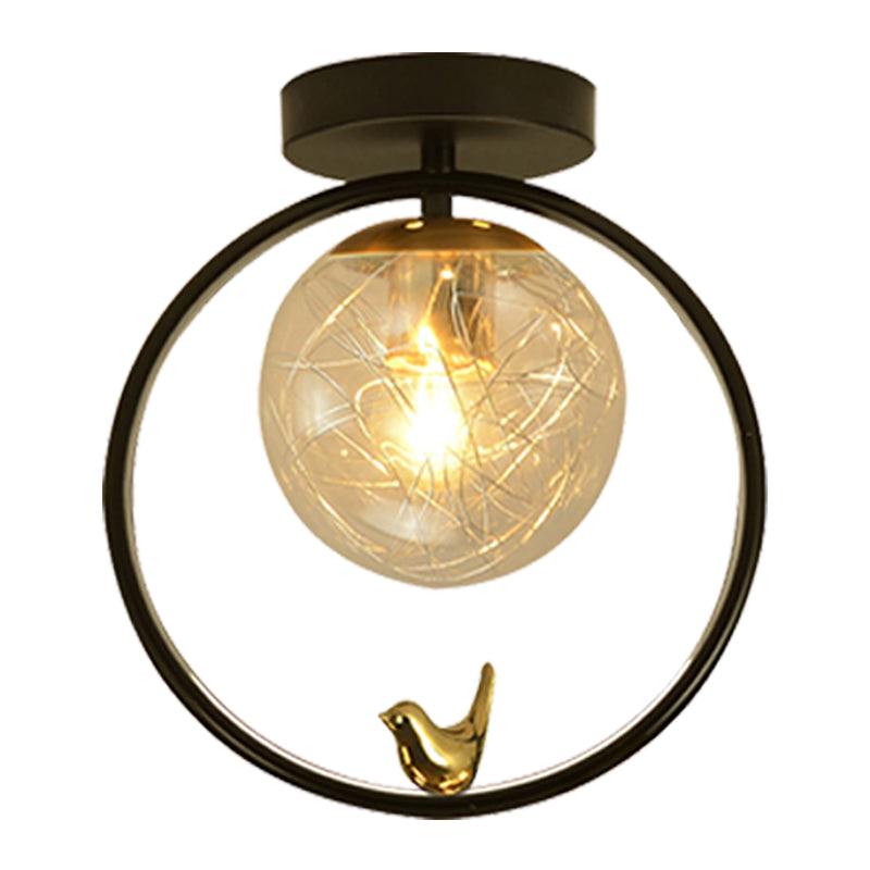 Contemporary Clear Glass Ceiling Light: Spherical Semi Flush Fixture with Single Bulb, Black Mount and Globe/Bird Decor