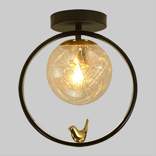 Contemporary Clear Glass Ceiling Light: Spherical Semi Flush Fixture with Single Bulb, Black Mount and Globe/Bird Decor