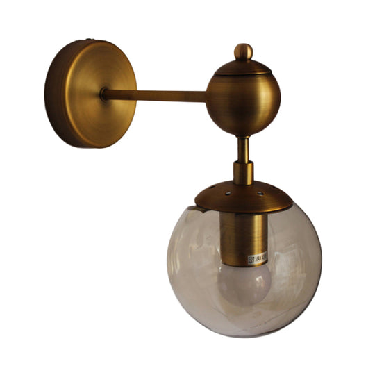 Post Modern Amber Glass Globe Wall Sconce With Brass Mount - 1/2 Light