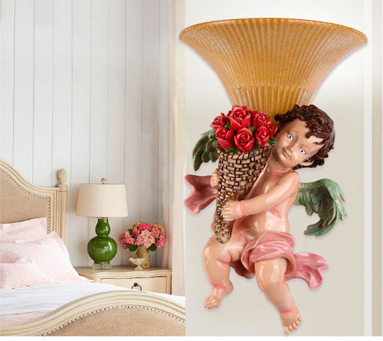 Traditional Boy Holding Rose Resin Wall Sconce Light With Fluted Glass Shade - Yellow