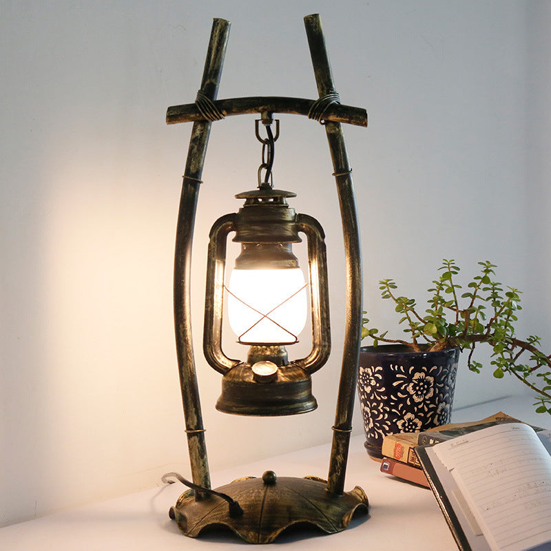 Opal Glass Kerosene Table Light With Antiqued Brass Frame And Farmhouse-Inspired Design