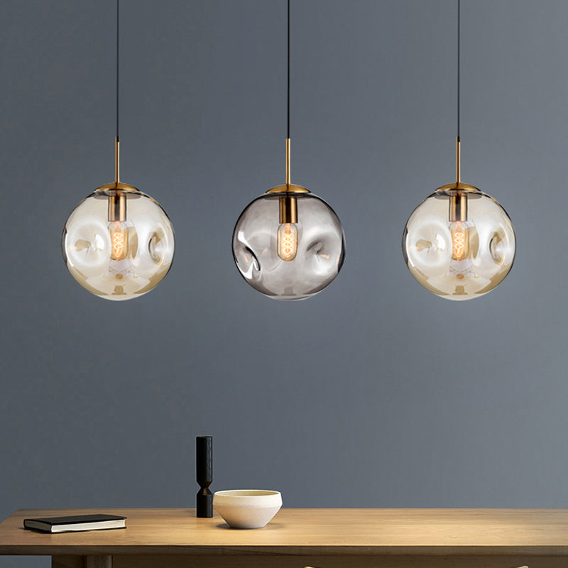 Dimpled Sphere Pendant Light: Modern Cognac/Smoke Grey Glass Brass Hanging Fixture For Living Room