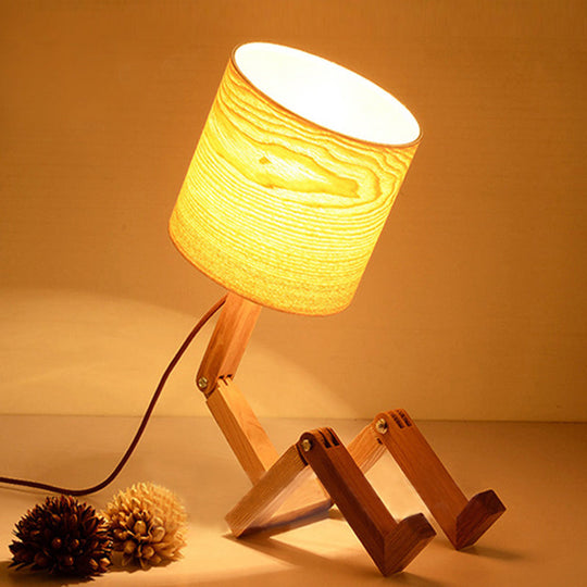 Modern Wood Man-Shaped Table Lamp With Book Rack And Cylinder Fabric Shade - Single