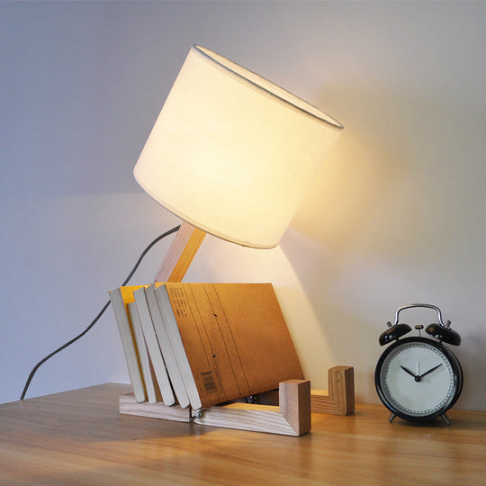 Modern Wood Man-Shaped Table Lamp With Book Rack And Cylinder Fabric Shade - Single