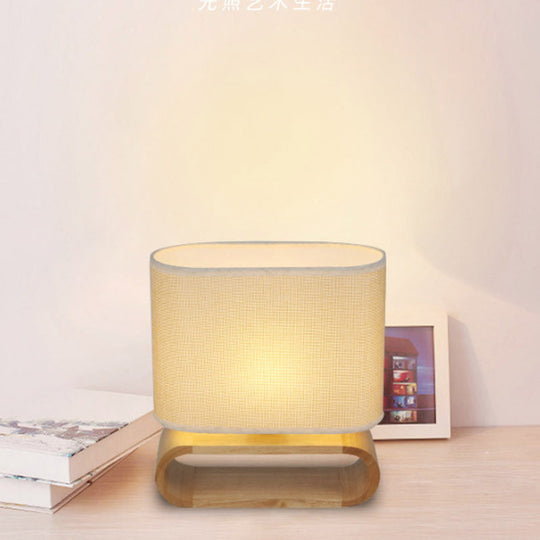 Minimalistic Wood Oval Nightstand Lamp - Single Fabric Table Light For Kids Bedroom