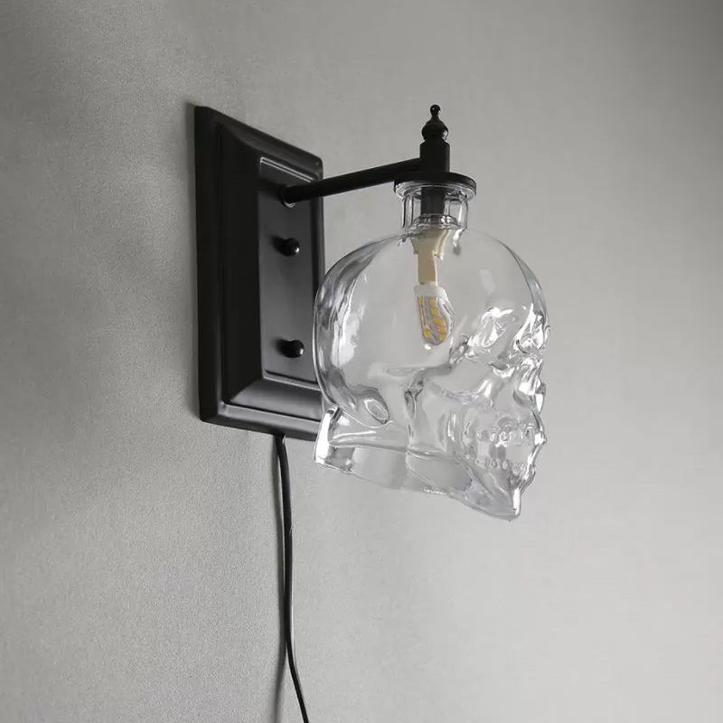 Skull Sconce Lamp - Clear Glass Decorative Wall Mounted Lighting Fixture With 1-Light In Black