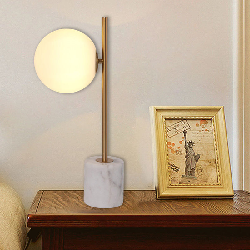 Simple White Glass Ball Night Lamp With Brass Pole And Marble Base