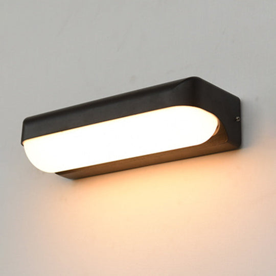 Modern Black Acrylic Wall Sconce With Flush Capsule Design And Half-Bulb Mounting