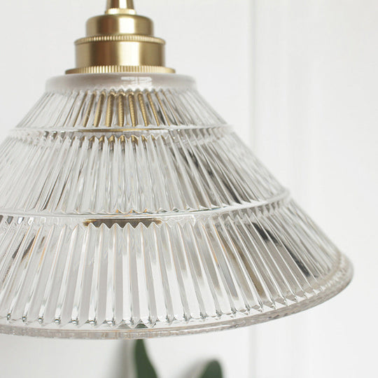 Clear Ribbed Glass Drop Lamp With Industrial Brass Cone Shade - 1-Light Ceiling Light For Dining