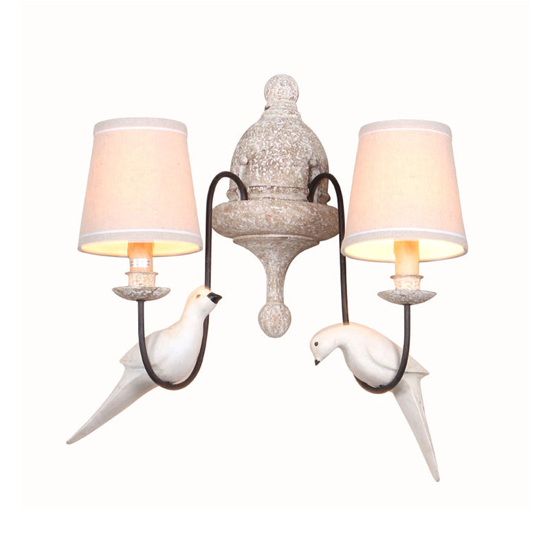 Traditional Beige Fabric Wall Sconce Light With 2-Head Barrel Design Curved Arm And Bird Decor