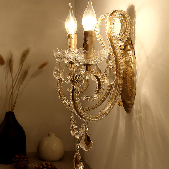 Brass Scrolled Arm Wall Lighting With Dropping Crystals - Traditional Metal Mount Fixture