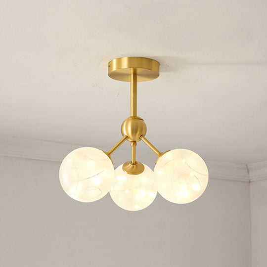 LED Starry Pendant Chandelier: Simple Brass Sphere Design with Glass Shade