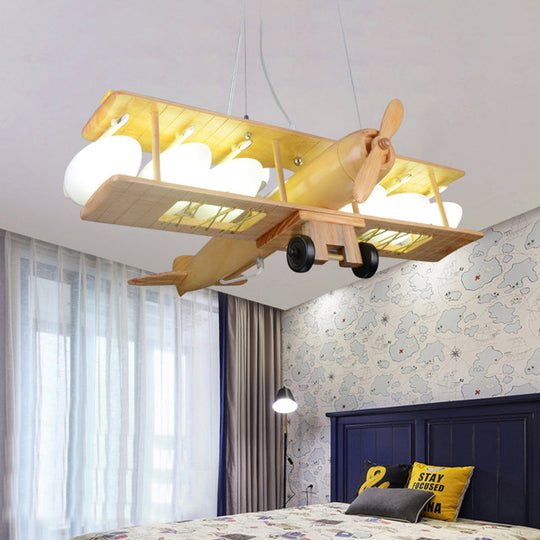 Nordic Beige Wood Pendant Light: Glider Shaped Hanging Light For Kindergarten