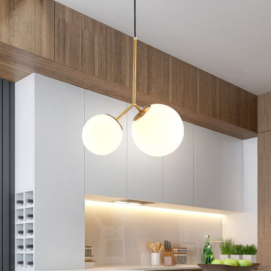 Modern Gold Spherical Chandelier Light: 2-Bulb Milky Glass Pendant For Dining Room