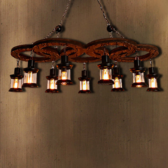 Coastal Lantern Chandelier: Clear Glass Lighting Pendant with Black Finish and Wooden Shelf