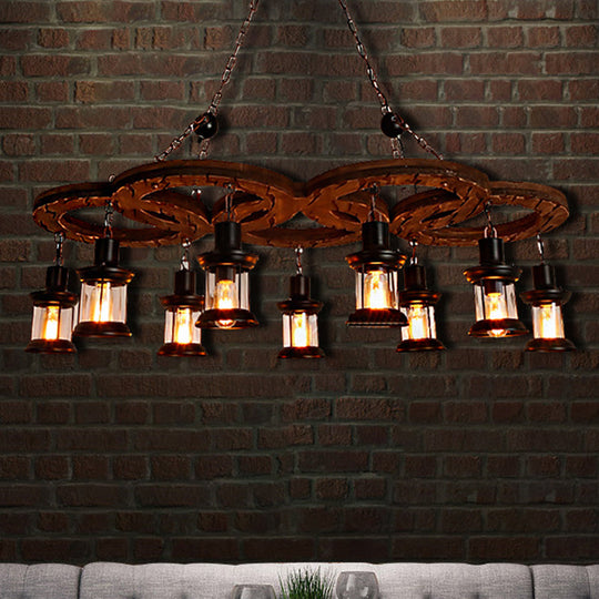 Coastal Lantern Chandelier: Clear Glass Lighting Pendant with Black Finish and Wooden Shelf