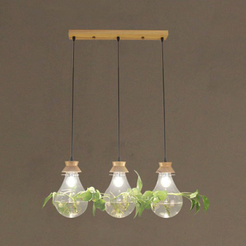 Rustic Clear Glass 3-Head Pendant Light With Bulb-Shaped Suspension For Restaurants And Planters 3 /