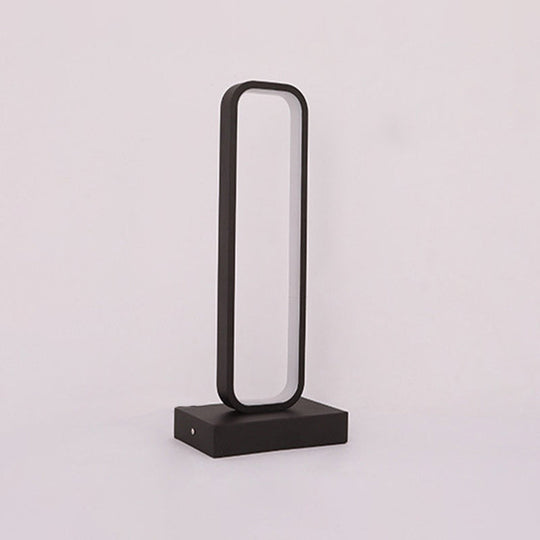 Minimalist Black Metal Led Bedside Table Lamp With Rounded Edges