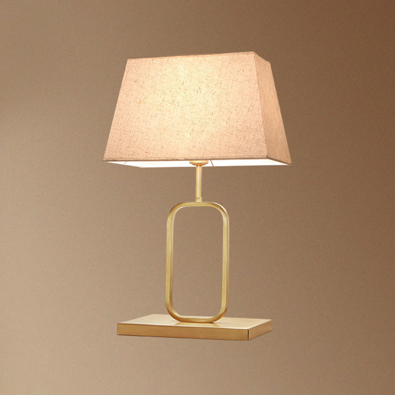 Modern Gold Bedside Table Lamp With Rounded Rectangle Shape And Fabric Shade