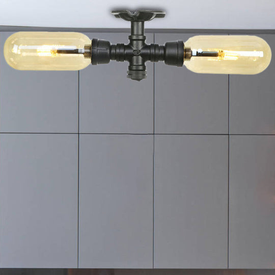 Rustic 2-Bulb Amber Glass Semi Mount Ceiling Light in Matte Black - Dining Room Lighting with Oval Shade and Pipe Design