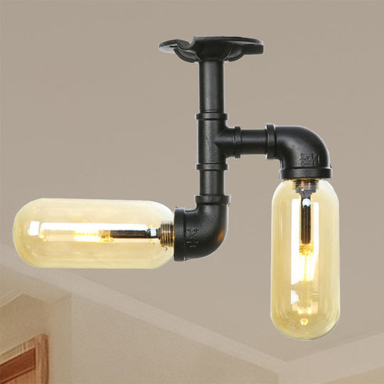 Rustic 2-Bulb Amber Glass Semi Mount Ceiling Light in Matte Black - Dining Room Lighting with Oval Shade and Pipe Design