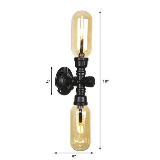 Industrial Dining Room Wall Sconce Lighting Fixture In Black - Amber Glass Capsule With Pipe Design