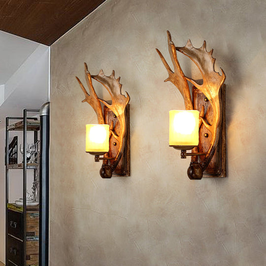 Antler Decor Wall Mount Light With Beige Glass Fixture In Brown - Traditional Cup Style