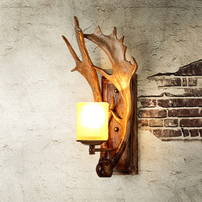 Antler Decor Wall Mount Light With Beige Glass Fixture In Brown - Traditional Cup Style