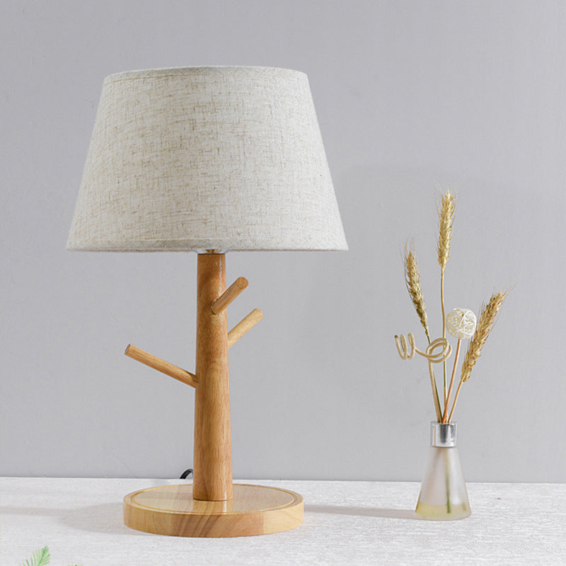 Minimalist Wood Tree Branch Nightstand Lamp With White Tapered Fabric Shade