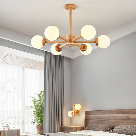 Sleek Minimalist Cream Glass Bedroom Chandelier Light with Wood-Embellished Modo Shaped Suspension"

OR

"Modo Shaped Suspension Light: Minimalist Cream Glass Chandelier with Wooden Accents for the Bedroom