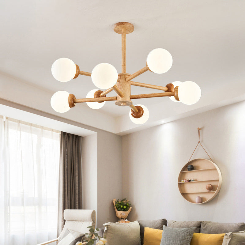 Sleek Minimalist Cream Glass Bedroom Chandelier Light with Wood-Embellished Modo Shaped Suspension"

OR

"Modo Shaped Suspension Light: Minimalist Cream Glass Chandelier with Wooden Accents for the Bedroom