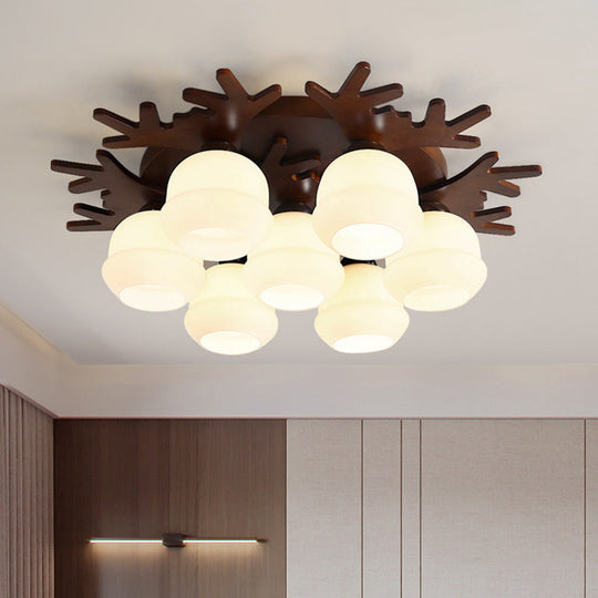 Nordic-style Wood Flush Ceiling Light with Antler Design and White Glass Shade