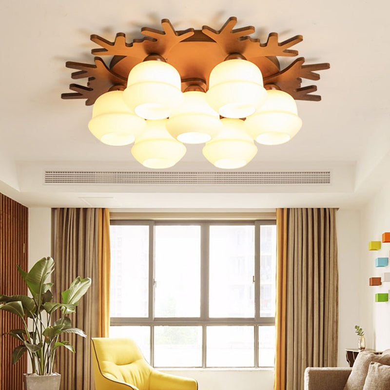 Nordic-style Wood Flush Ceiling Light with Antler Design and White Glass Shade