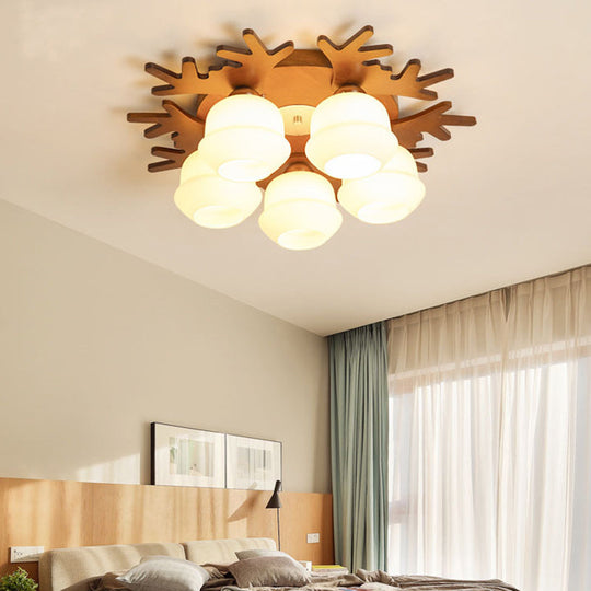 Nordic-style Wood Flush Ceiling Light with Antler Design and White Glass Shade