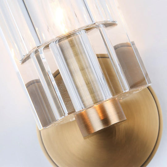 Modern Clear Crystal Cylinder Wall Lamp With Brass Backplate - 1 Light Fixture