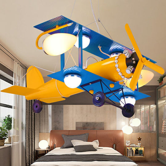 Yellow Led Nursery Chandelier With Jet Plane Design And Cream Glass Shade