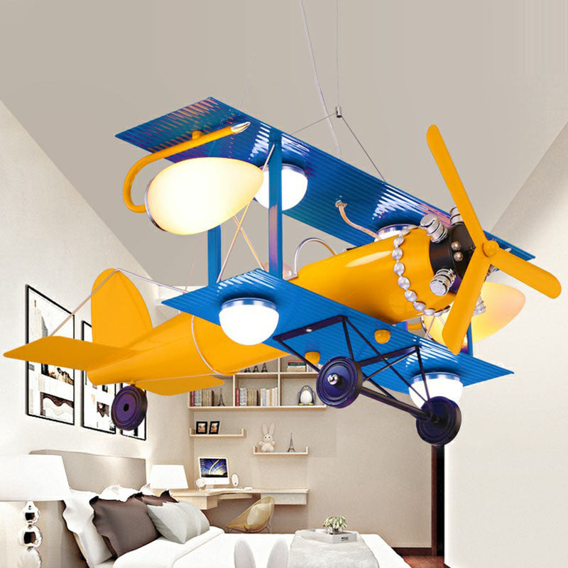 Yellow Led Nursery Chandelier With Jet Plane Design And Cream Glass Shade