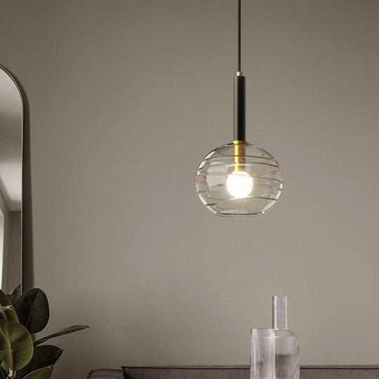 Black Textured Glass Dining Room Pendant With Modern Spherical Hanging Design