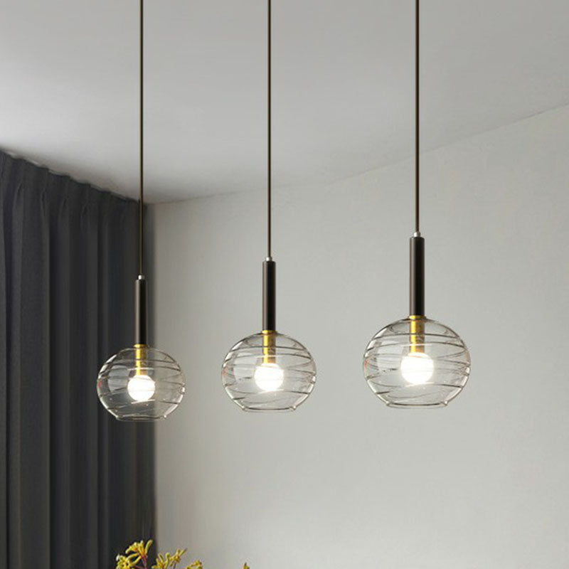 Black Textured Glass Dining Room Pendant With Modern Spherical Hanging Design