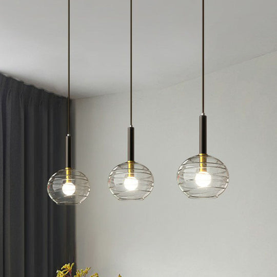 Black Textured Glass Dining Room Pendant With Modern Spherical Hanging Design