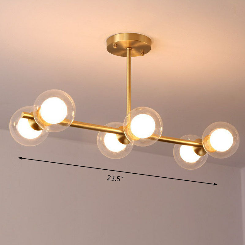 Brass Finish 6-Light Postmodern Linear Island Pendant With Glass Ball Shade Clear